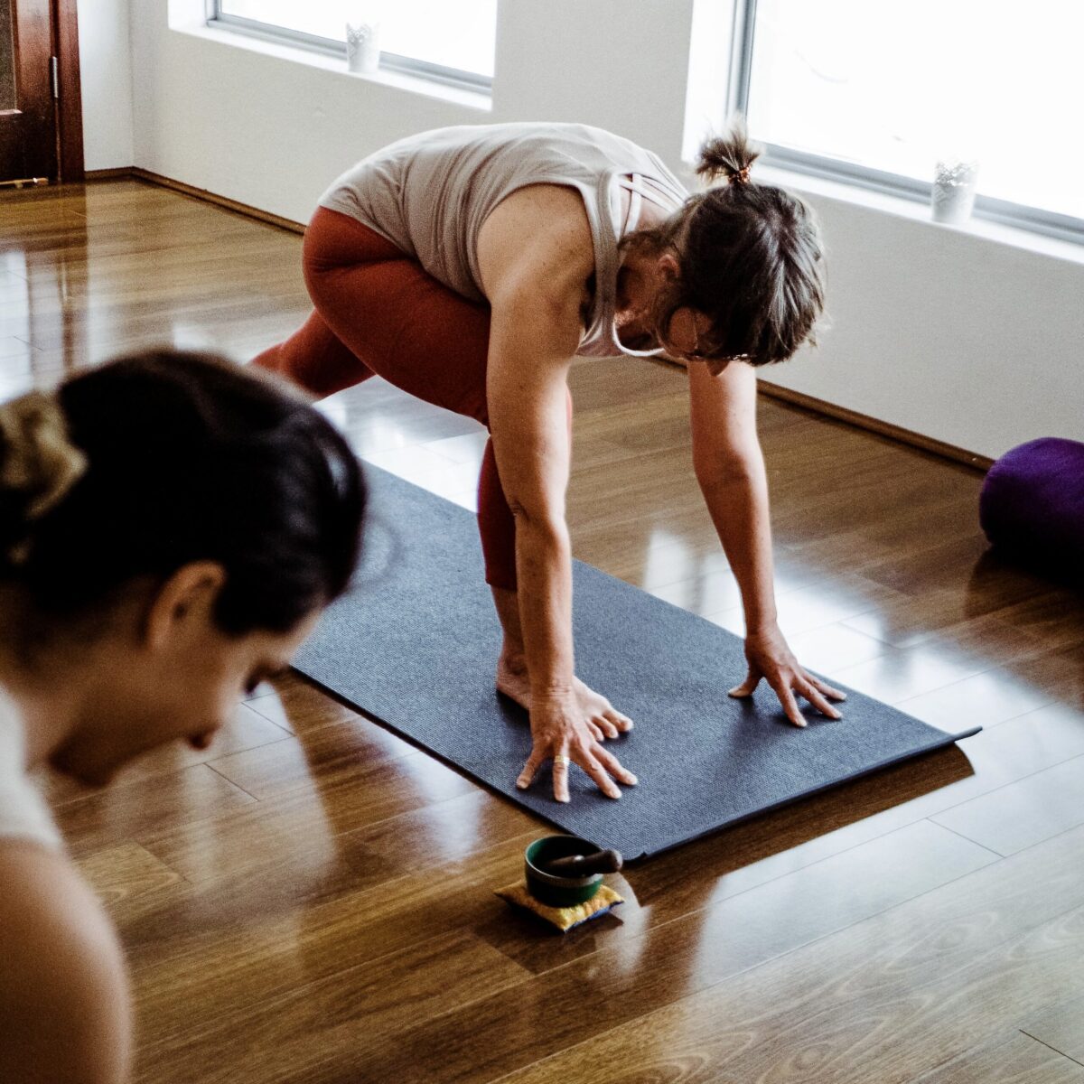 Sunrise Vinyasa yoga classes - high lunge posture at a yoga studio