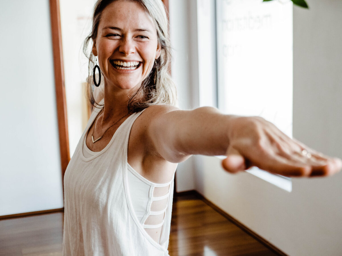 Woman in warrior 2 yoga pose